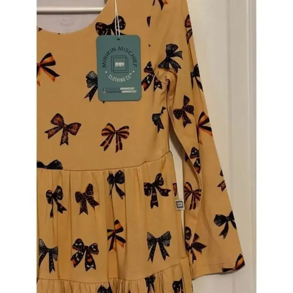 Minikin Mischief Girls Mustard Yellow Bow Print Long Sleeve Tiered Ruffle Dress